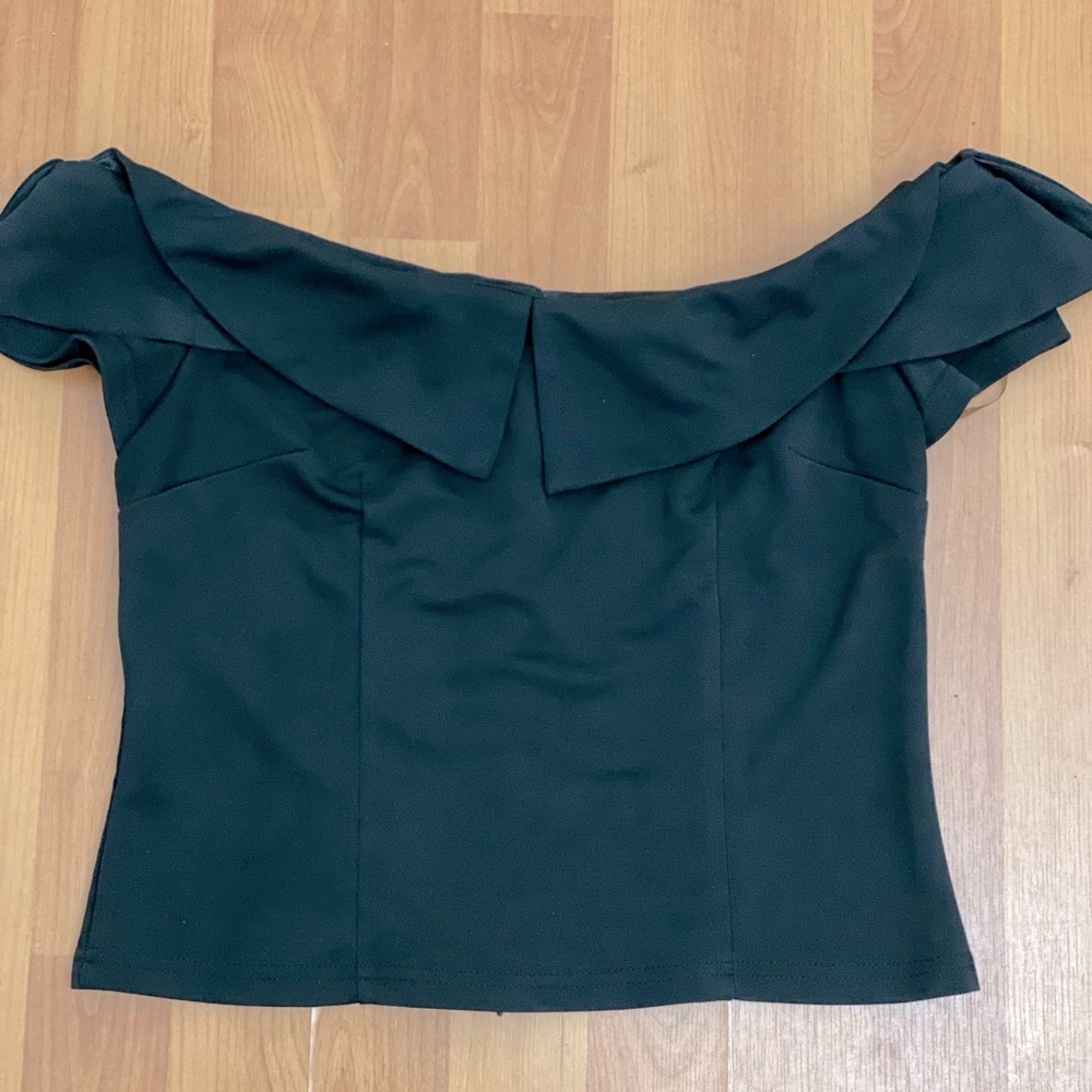Black off shoulders top.